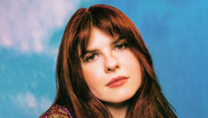 Image of Catie Turner w/ Kiss Bang